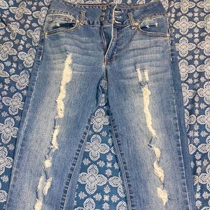 Light blue ripped jeans